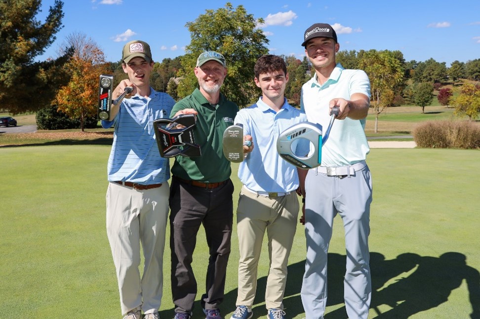 Group of golfers, including VHCC President Adam Hutchison, prepare to tee-off