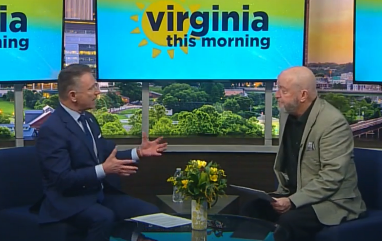 Image of Chancellor Dore during TV interview