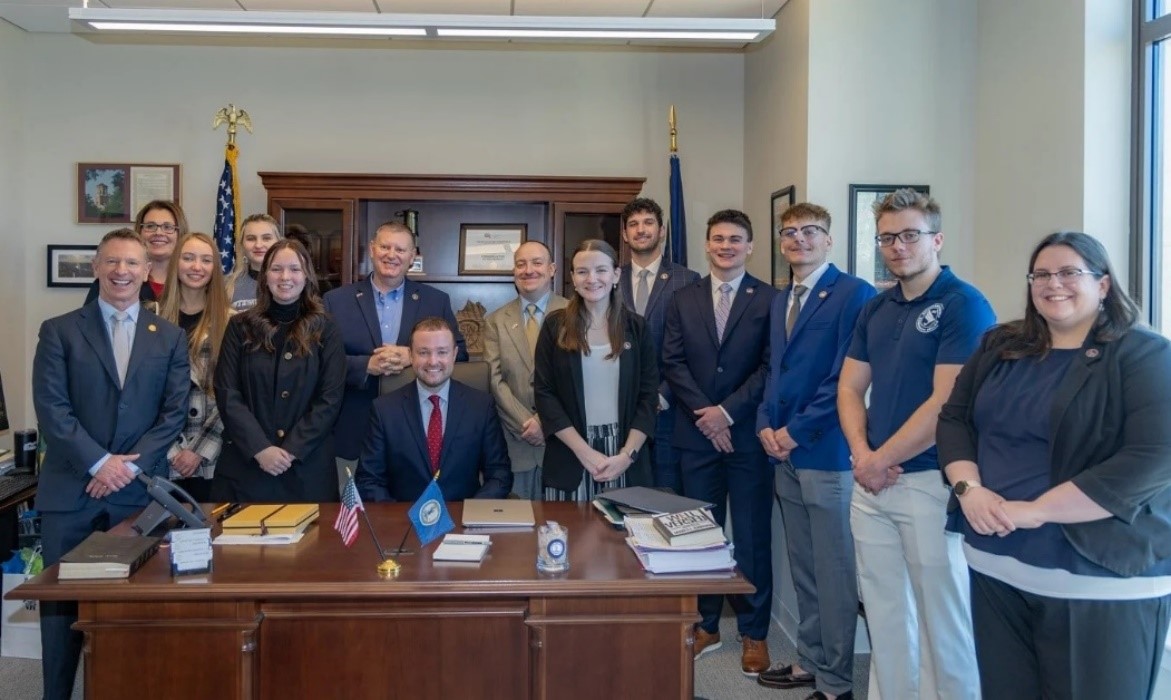 Image of the chancellor and students at the GA