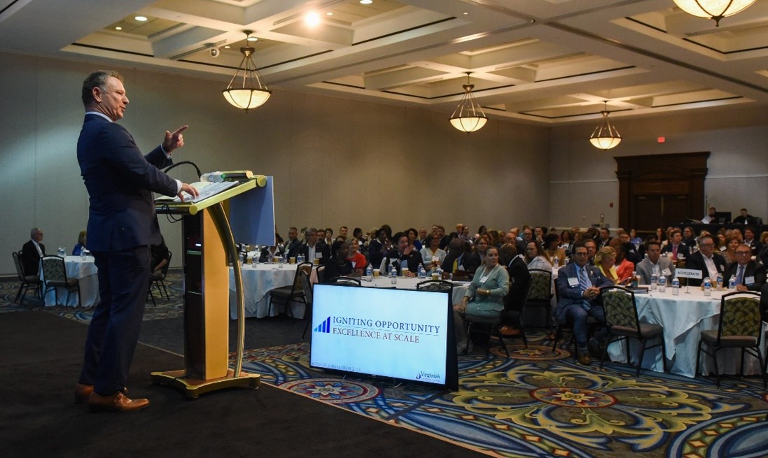 Image of the chancellor addressing retreat attendees