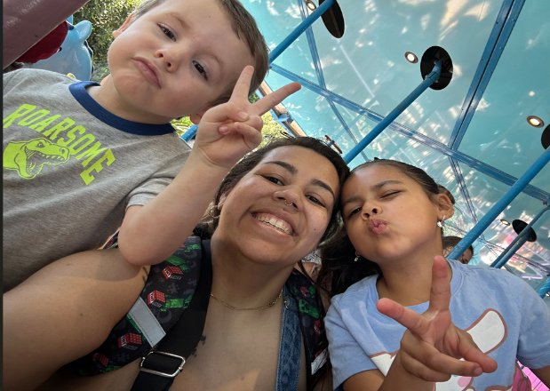 Briona Simmons smiling with her two children