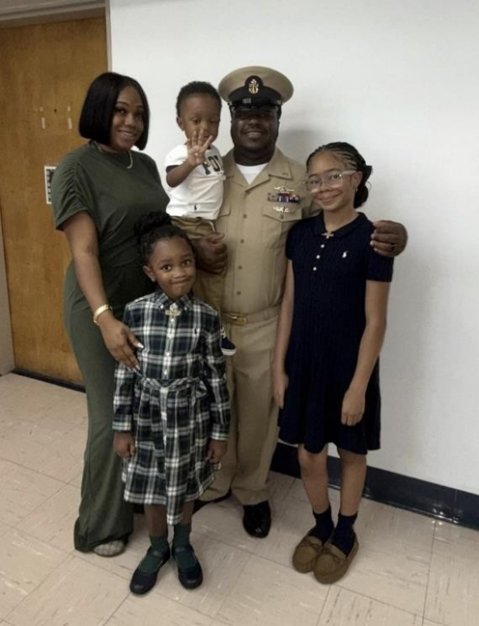 Kenisha Kenol with her husband in Navy uniform and their three children